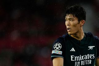 Takehiro Tomiyasu Right-Back of Arsenal and Japan during the UEFA Champions League match between Sevilla FC and Arsenal FC at Estadio Ramon Sanchez Pizjuan on October 24, 2023 in Seville, Spain.