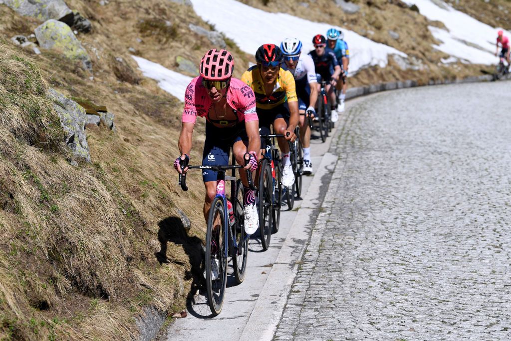 ANDERMATT SWITZERLAND JUNE 13 Rigoberto Uran Uran of Colombia and Team EF Education Nippo Richard Carapaz of Ecuador and Team INEOS Grenadiers yellow leader jersey Michael Woods of Canada and Team Israel StartUp Nation in breakaway during the 84th Tour de Suisse 2021 Stage 8 a 1595km stage from Andermatt to Andermatt Gotthardpass 2106m Cobblestones UCIworldtour tds tourdesuisse on June 13 2021 in Andermatt Switzerland Photo by Tim de WaeleGetty Images