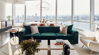 A beautifully designed home with a green sofa in Tribeca Pied-a-Terre