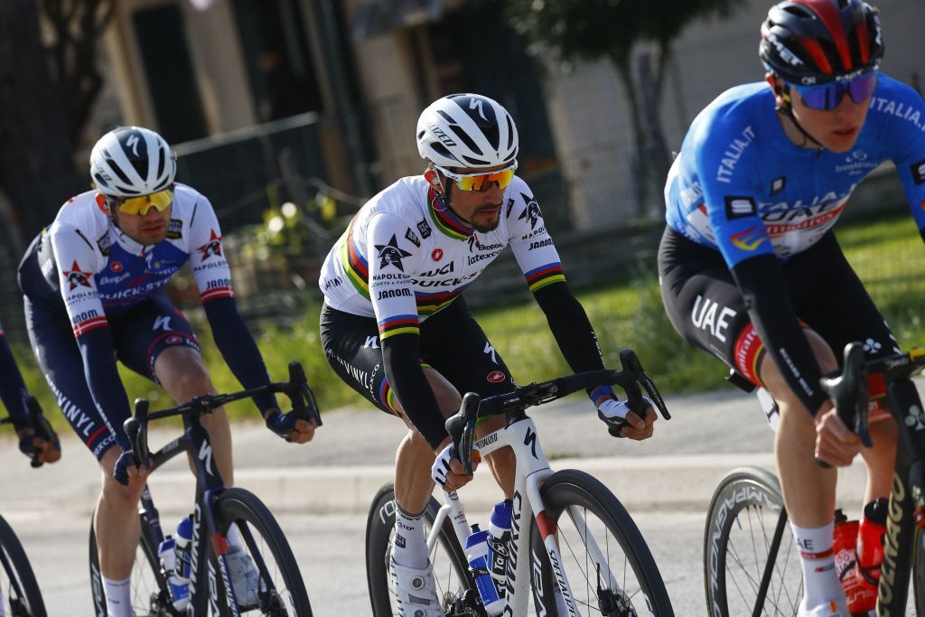 Team Deceunincks Julian Alaphilippe of France C rides during the 5th stage of the Tirreno Adriatico cycling race 155 km from Sefro to Fermo on March 11 2022 Photo by Luca Bettini AFP Photo by LUCA BETTINIAFP via Getty Images