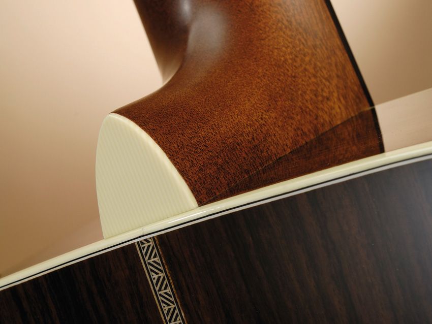 A combination of Indian Rosewood and subtle marquetry