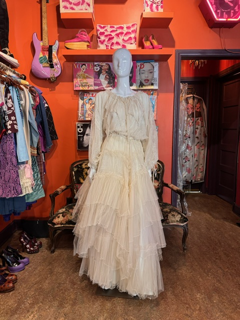 Layered ruffle champagne dress.