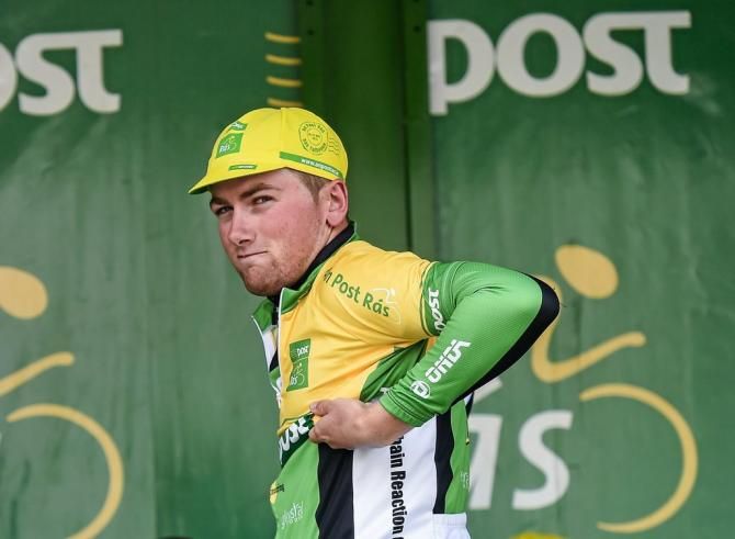 Robert-Jon McCarthy (An Post Chain Reaction) pulls on the yellow jersey