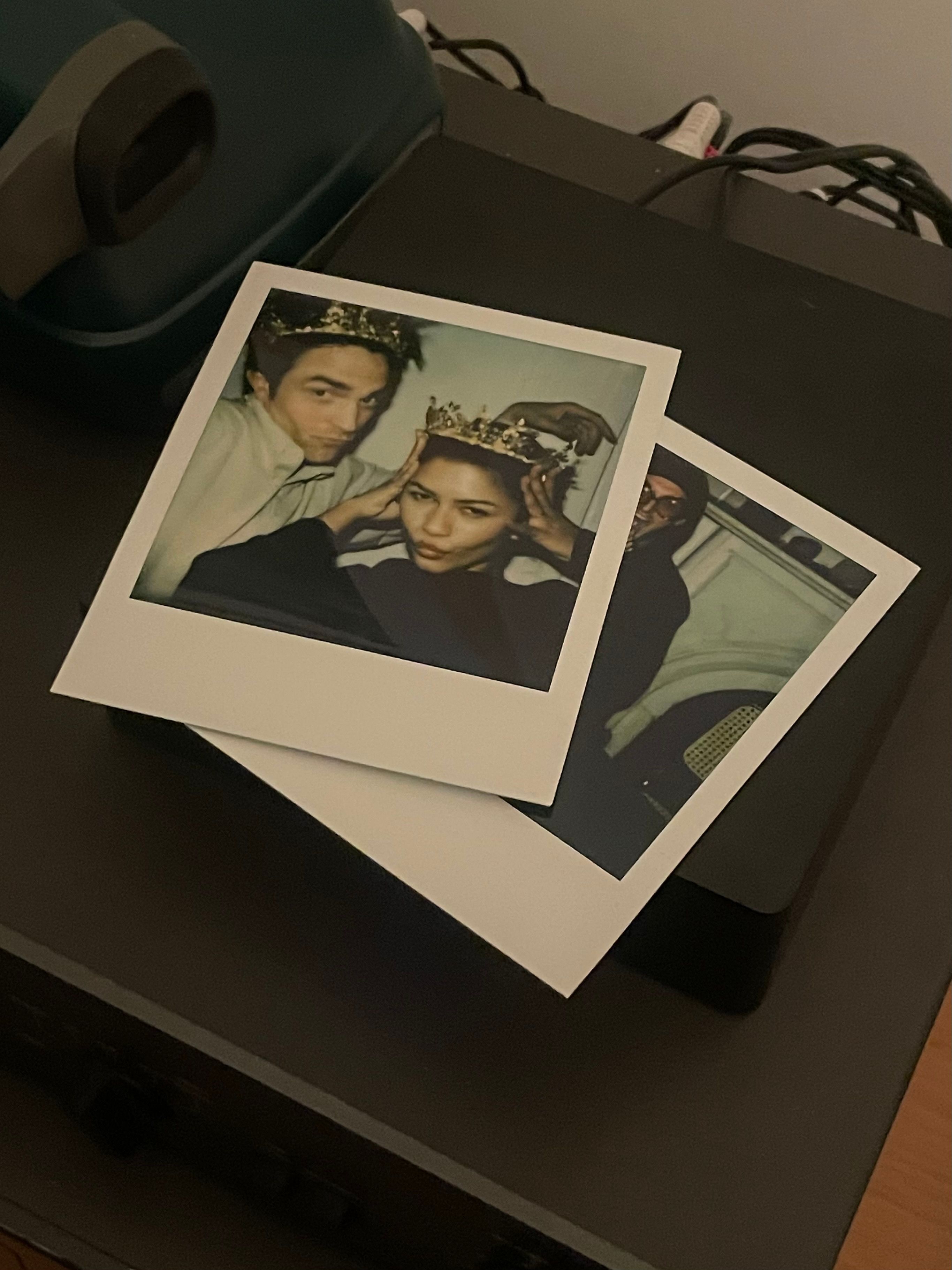 A series of interior shots of an art and objects-filled, dimly lit apartment, a museum's gallery rooms, an empty dance rehearsal room, and colorfully decorated office spaces.