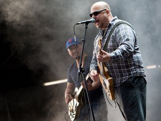 Frank Black on stage with fellow Pixie Joey Santiago