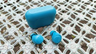 JLab Go Pop Plus in blue finish on garden table