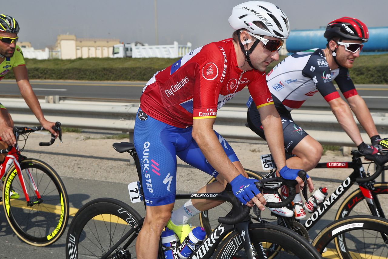 Elia Viviani wearing the red jersey of points classification
