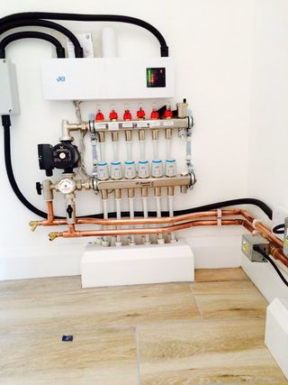 Underfloor heating manifold installation