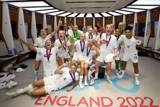 The England team celebrate in Wembley's dressing rooms after winning the Women's Euro 2022