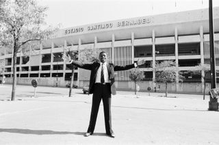 Laurie Cunningham poses outside Real Madrid's Santiago Bernabeu stadium in October 1982.