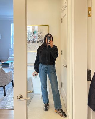 @nicoleakhtarzad outfit mirror selfie cardigan and jeans