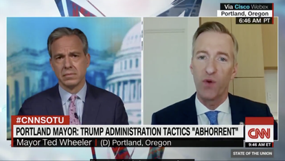 Jake Tapper and Ted Wheeler.