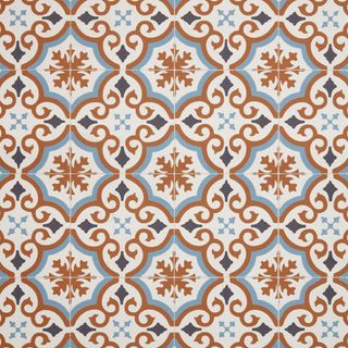 A highly decorative terracotta mosaic floor in orange, white and blue shades