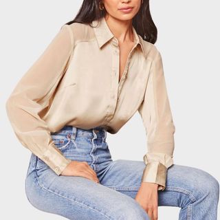 Image of woman wearing satin blouse