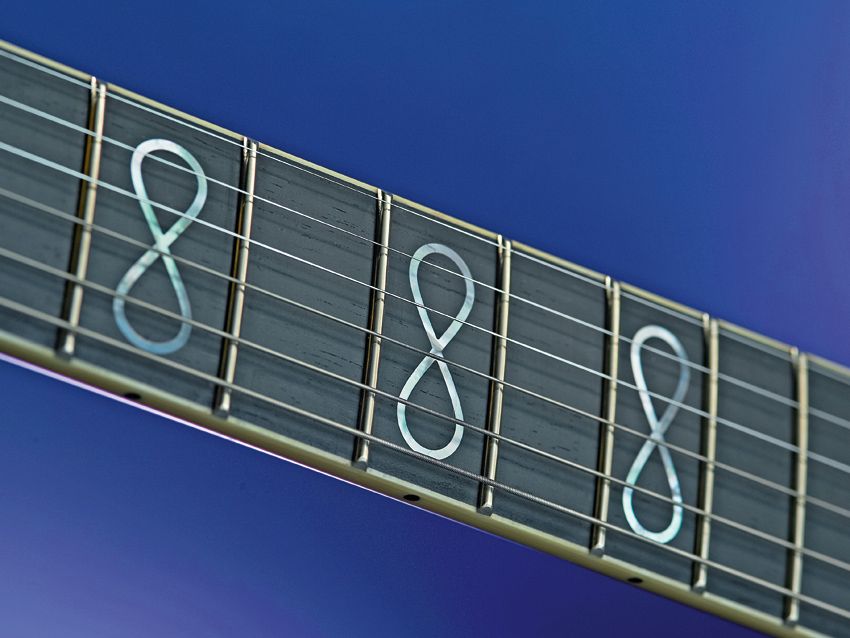 Pearl Infinity inlays are optional.