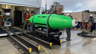 Scripps researchers aboard the Research Vessel Sally Ride prepare to depart for the expedition in March 2021. The REMUS 6000 and Bluefin autonomous underwater vehicles (AUVs) were used to survey the seafloor for discarded DDT barrels.