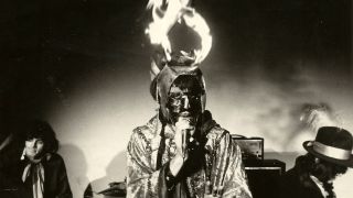 English singer-songwriter Arthur Brown performs on stage with the 'Crazy World Of Arthur Brown' wearing a burning helmet headdress, circa 1968. (Photo by Mark and Colleen Hayward/Getty Images)