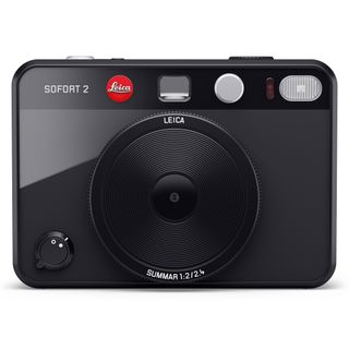 Leica Sofort 2 camera, in black, against a white background