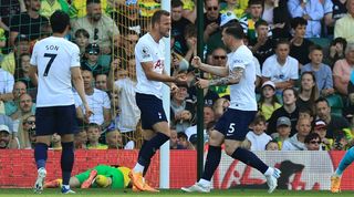 Tottenham players celebrate after Harry Kane scores against Norwich at Carrow Road.