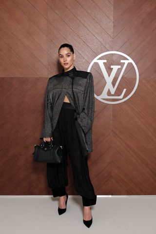 Adria Arjona at the Louis Vuitton F/W 25 runway show.