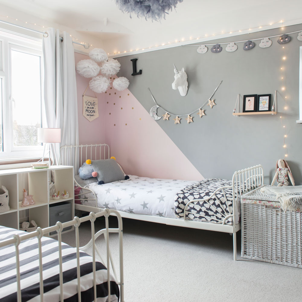 girls bedroom with bed and carpet floor