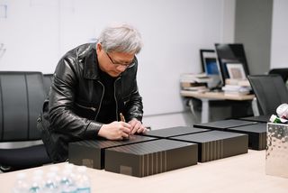 Nvidia CEO Jason Huang signing RTX 3090 boxes