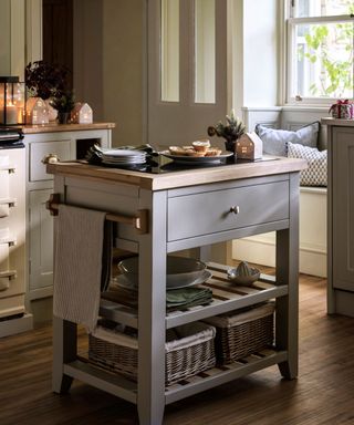 A butchers block kitchen island decorated with Christmas ornaments