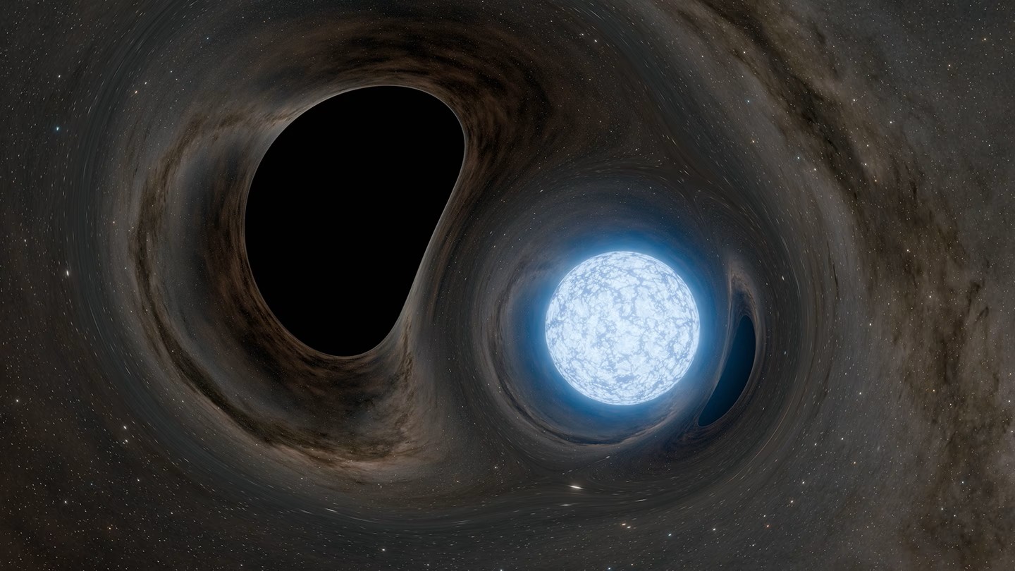 An illustration of warped space, showing a squished black hole next to a bright blueish white star.