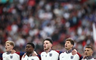 England players sing the national anthem ahead of their Euro 2024 warm-up game against Iceland at Wembley in June 2024.