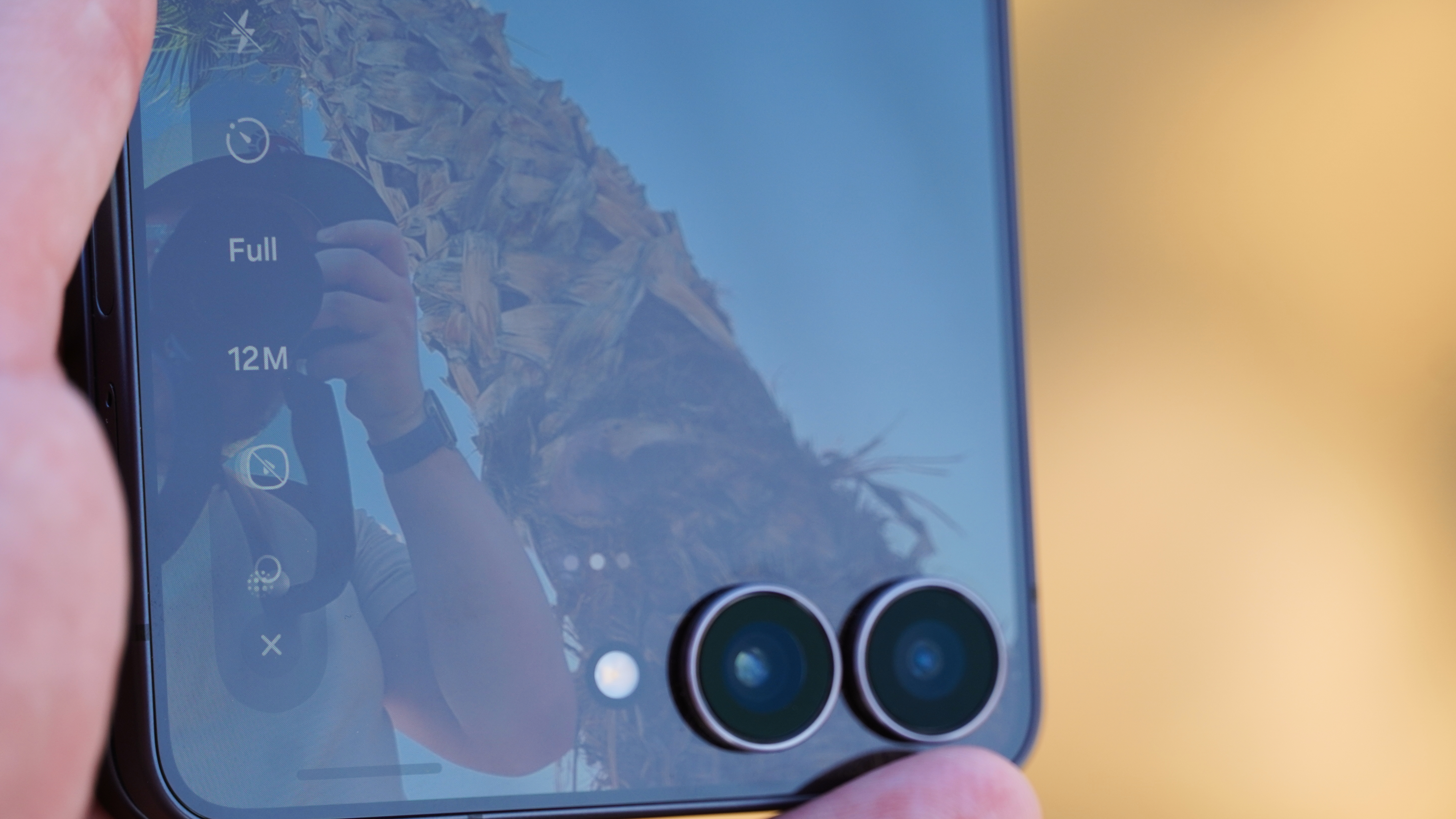 The Samsung Galaxy Z Flip 7 rear cameras with the viewfinder open.