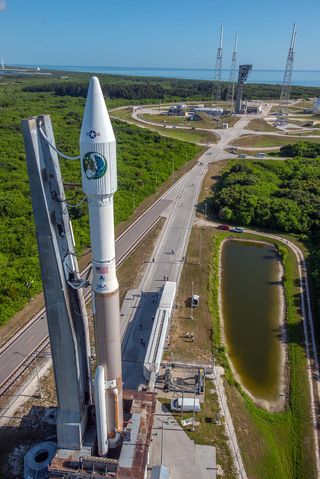 The United Launch Alliance Atlas V rocket carrying the classified NROL-61 satellite is rolled from the Vertical Integration Facility to the pad at Space Launch Complex-41 at the Cape Canaveral Air Force Station in Florida.