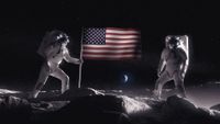A concept image of NASA astronauts in spacesuits planting the American flag on the lunar South Pole. 