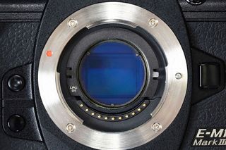 Close up of the OM System E-M1 Mark III Astro camera with BMF-LPC 01 filter