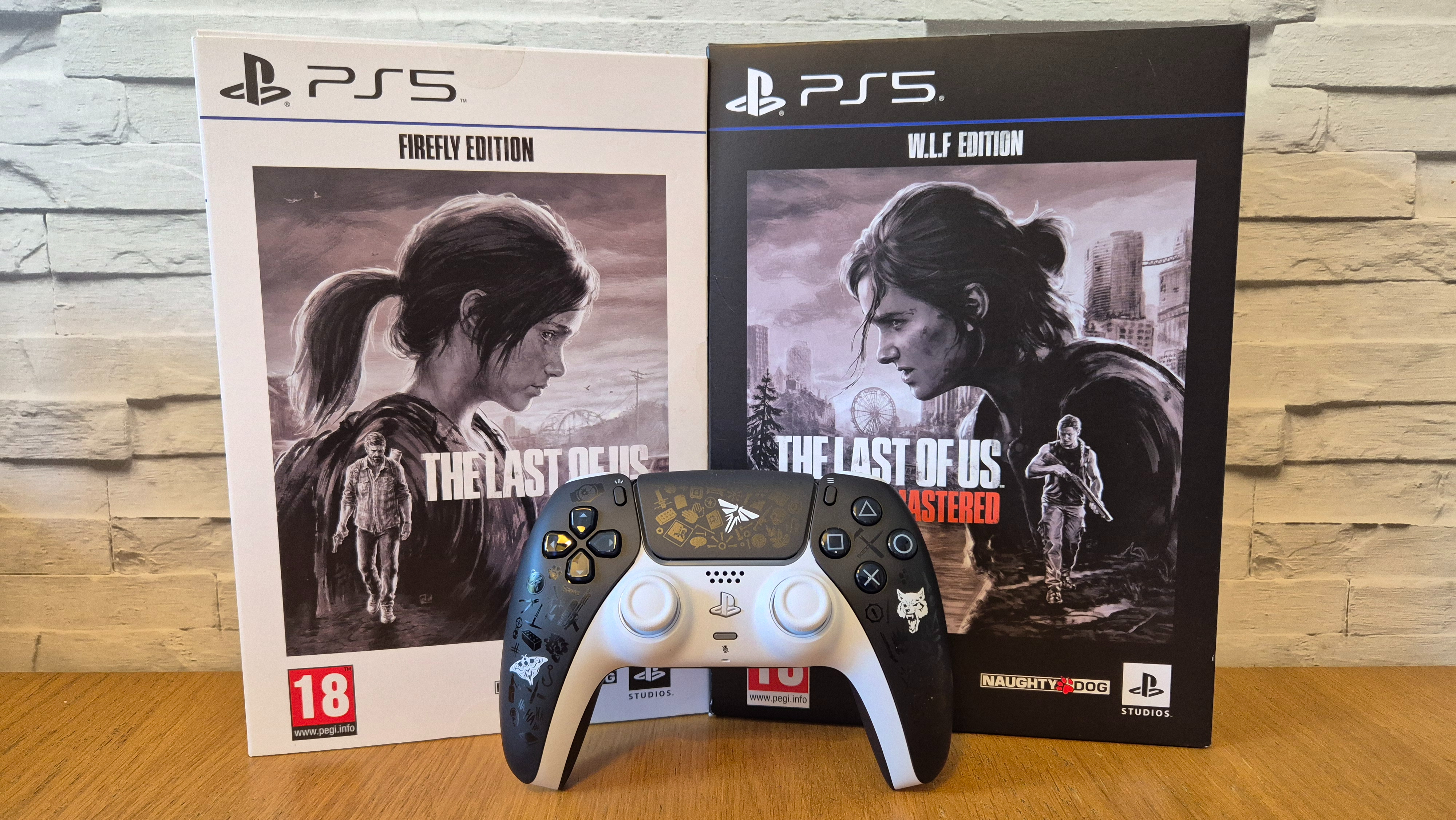 The Last of Us Limited Edition DualSense on a wooden surface in front of a white brick background