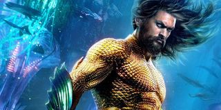 Jason Momoa in classic Aquaman costume underwater in 2018 film