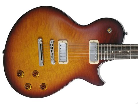 An offset Les Paul-style outline and mini humbuckers. Interesting...
