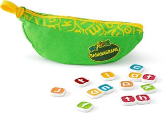 A green zippered banana-shaped pouch filled with My First Bananagrams tiles