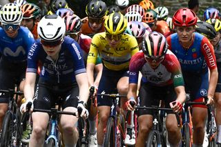 Fenix-Deceuninck team &#039;s Dutch rider Puck Pieterse (2L) and Team SD Worx - Protime&#039;s Dutch rider Demi Vollering (C) wearing the overall leader&#039;s yellow jersey (C) with the pack of riders (peloton) ride during the ascension of Cote de la Redoute in the 4th stage (out of 8) of the third edition of the Women&#039;s Tour de France cycling race, a 122.7 km between Valkenburg and Liege, on August 14, 2024. (Photo by JULIEN DE ROSA / AFP)