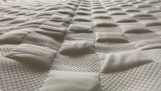 A closeup of the surface of the Levitex Gravity Defying mattress topper cover