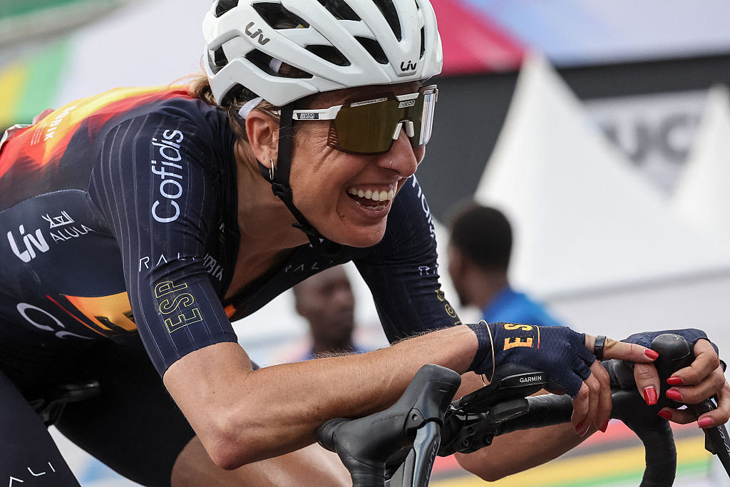 Spanish rider Margarita Victoria Garcia Canellas celebrates after crossing the finish line to place third in the women&#039;s Elite road race cycling event during the UCI 2025 Road World Championships, in Kigali, on September 27, 2025. (Photo by Anne-Christine POUJOULAT / AFP)