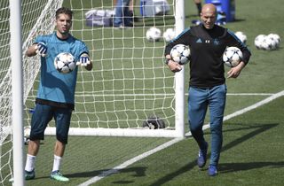 Real Madrid coach Zinedine Zidane and son Luca during Real Madrid training in 2018.