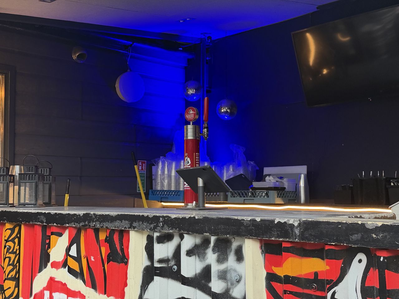 iPhone 17 Pro camera sample showing bar scene at 2x zoom