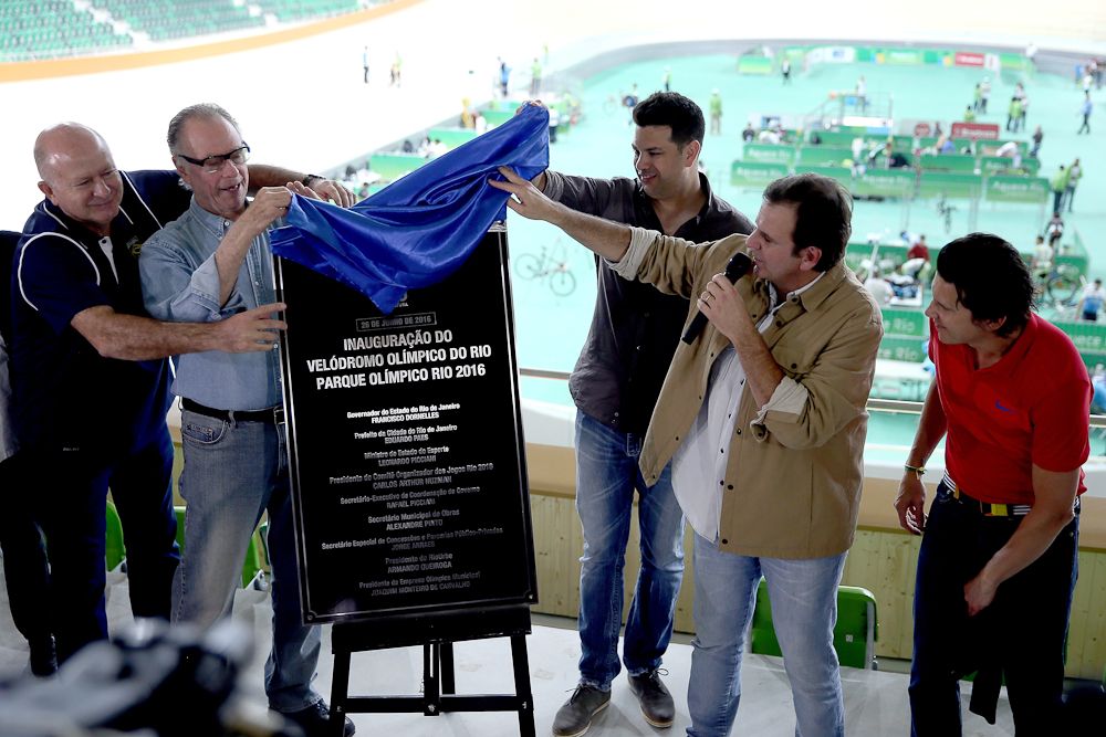 Carlos Arthur Nuzman, President of the Rio 2016 Organizing Committee and Rio de Janeiro Mayor Eduardo Paes unveil a plaque at the delivery of the Olympic Velodrome to the Rio 2016 Committee at Olympic Park
