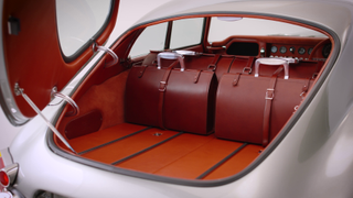 The Helm Jaguar E-Type features bespoke fitted luggage by Bill Amberg Studio