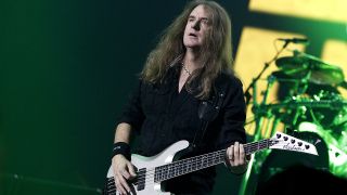 David Ellefson performs on stage with Megadeth