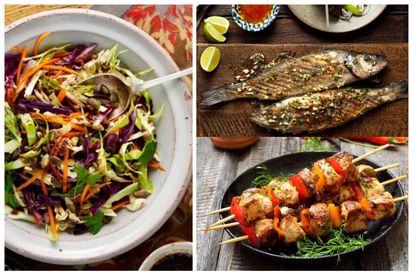 A selection of the best healthy BBQ food ideas including rainbow slaw grilled seabass and chicken kebab skewers on a plate