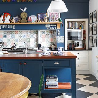 kitchen room with blue walls and kitchen countertop