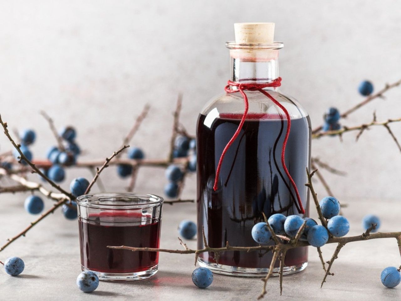 Glass Bottle Of DIy Sloe Gin