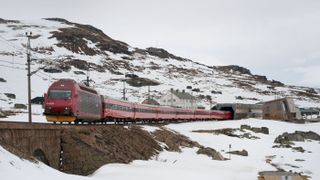 A train departs Finse station for Bergen