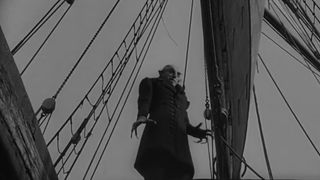 Count Orlak walks on a ship in Nosferatu